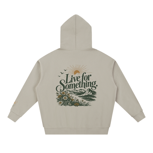Oat gray heavyweight hoodie shown from the back, with the “Live for Something” landscape, sunburst, and wildflower graphic.