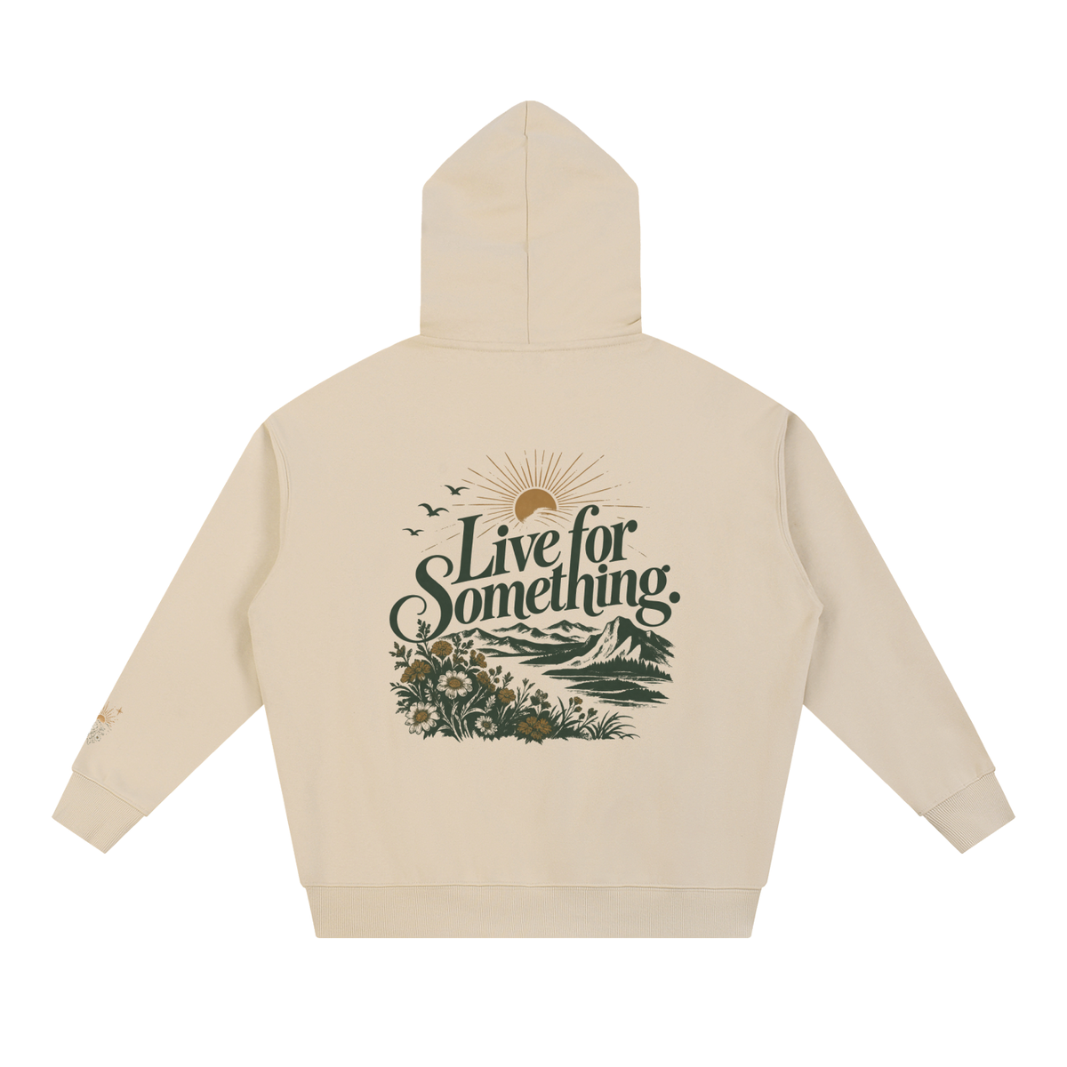 Apricot heavyweight hoodie shown from the back, with the “Live for Something” landscape, sunburst, and wildflower graphic.